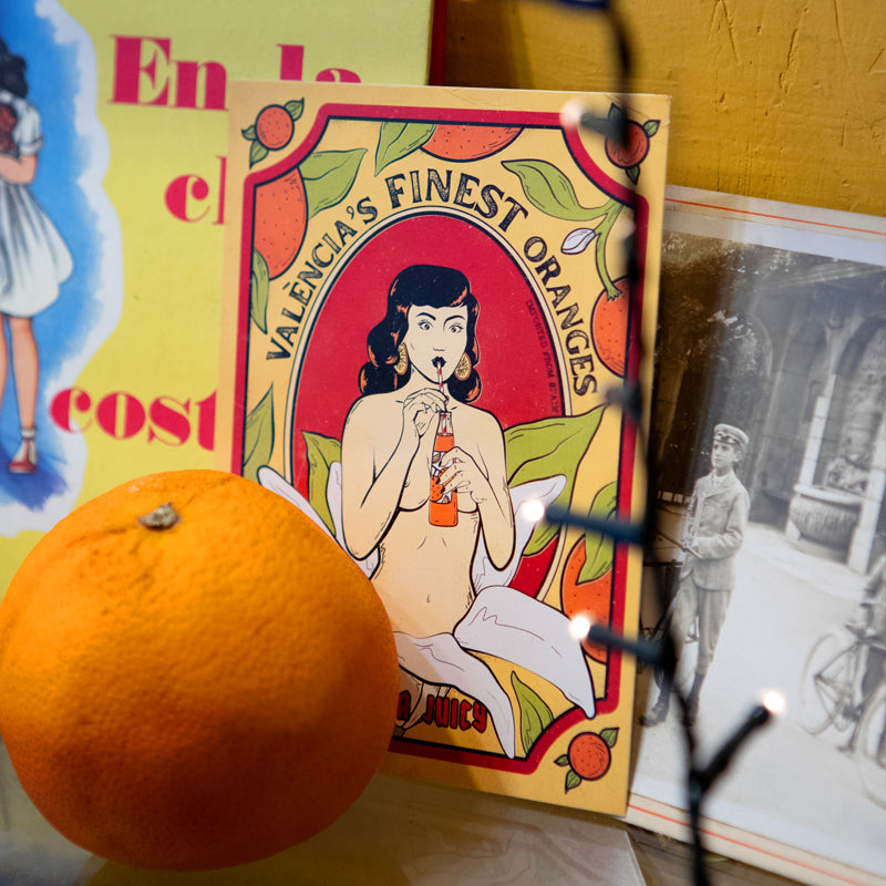 Chica Pin Up con naranjas